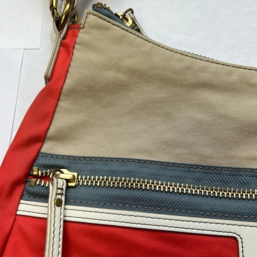 Fossil hobo shoulder and crossbody orange and tan textile bag 3 zipper closures